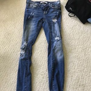 Zara brand distressed medium wash skinny jeans